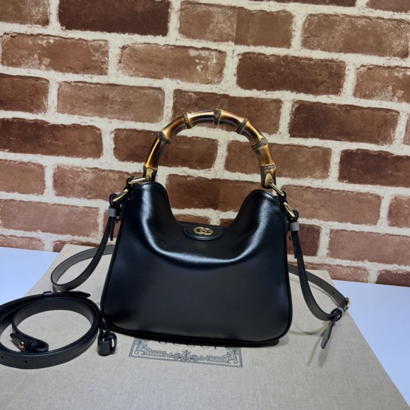 G*u*i top handle bags